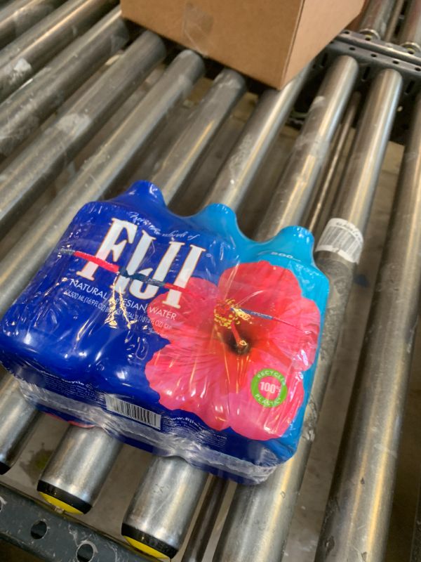 Photo 1 of FIJI Natural Artesian Bottled Water 500 mL / 16.9 Fl Ounce (Pack of 6) - 100% Recycled Plastic