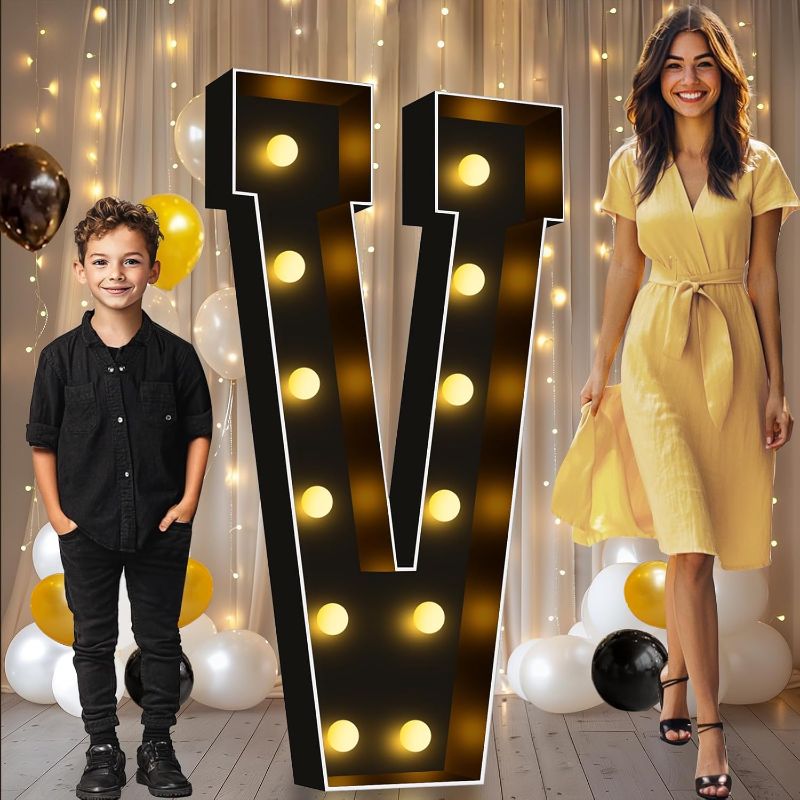 Photo 1 of Pooqla 4 FT Marquee Light Up Letters, Black Marquee Letter Lights 4 Feet Tall for Birthday Decoration, Big Mosaic Letters Sign for Balloons Party Anniversary Wedding Decorations, Giant Warm White V
