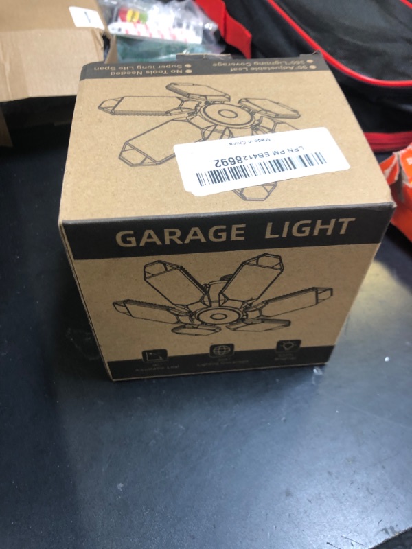 Photo 1 of Garage Light LED 100W 10000LM with 6 Deformable Panels, E26/E27 Screw in Shop Light, 6000K Light Bulb Led Garage Ceiling Lights for Porch Barn Basement Attic