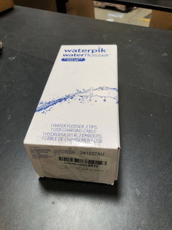 Photo 1 of Waterpik Cordless Pulse Rechargeable Portable Water Flosser for Teeth, Gums, Braces Care and Travel with 2 Flossing Tips, Waterproof, ADA Accepted, WF-20 White, Packaging May Vary