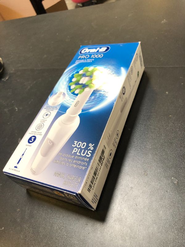 Photo 1 of Oral-B Pro 1000 Rechargeable Electric Toothbrush, White