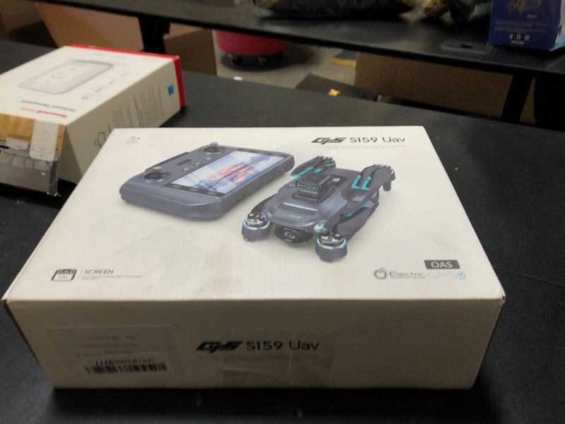 Photo 1 of GPS RC Drone With Screen Display, One Click Return, Tracking Function, Speed Adjustment, LED Lights, Quadcopter, Gesture Shooting, Optical Flow Positioning, Headless Mode, Dual Cameras, Automatic Return When Battery Is Low Or Disconnected, Beginner-Friend