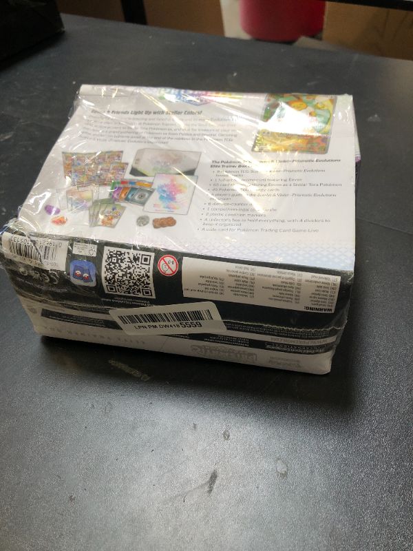 Photo 1 of Pokemon TCG: Scarlet & Violet—Prismatic Evolutions Elite Trainer Box DAMAGED PKG
