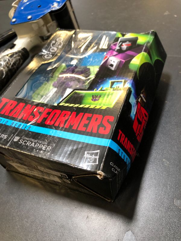 Photo 1 of Transformers Toys Studio Series Voyager Class The Movie Constructicon Scrapper, 6.5-inch Converting Action Figure, Robot Toys, 8+