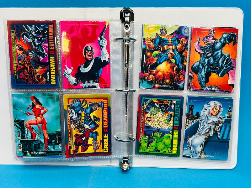 Photo 1 of 025003…final sale no returns/refunds- 120 mixed Marvel trading cards in binder