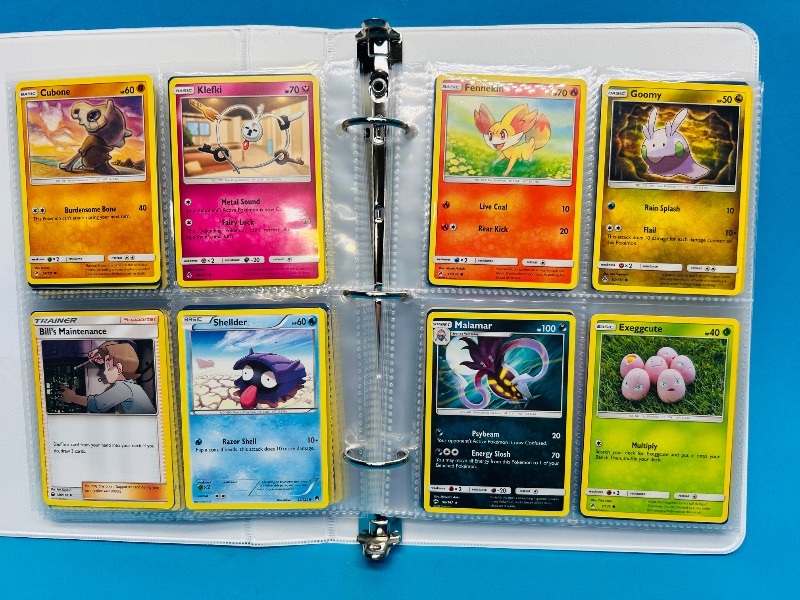 Photo 1 of 025004…final sale no returns/refunds- 160 mixed Pokemon cards in binder