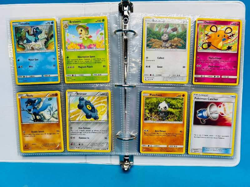 Photo 1 of 025005… final sale no returns/refunds- 160 mixed Pokemon cards in binder