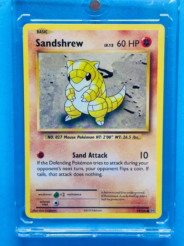 Photo 1 of 025012…Sandshrew Pokémon card in hard plastic case 