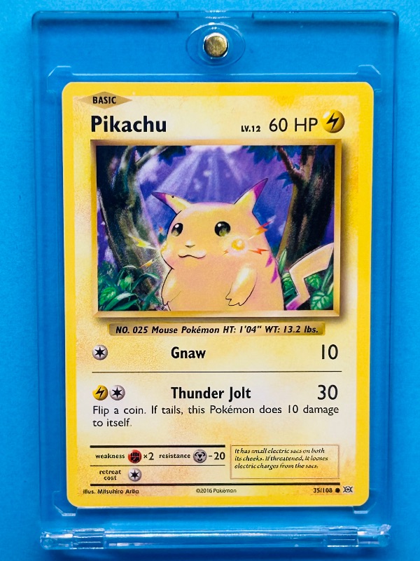 Photo 1 of 025016…Pikachu Pokémon card in hard plastic case 