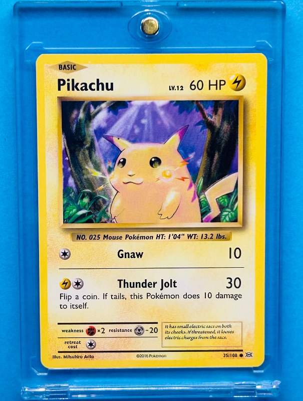 Photo 1 of 025016…Pikachu Pokémon card in hard plastic case 