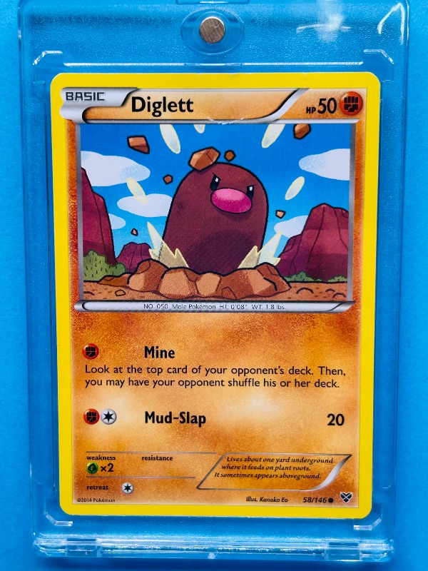 Photo 1 of 025021…Diglett Pokémon card in hard plastic case 