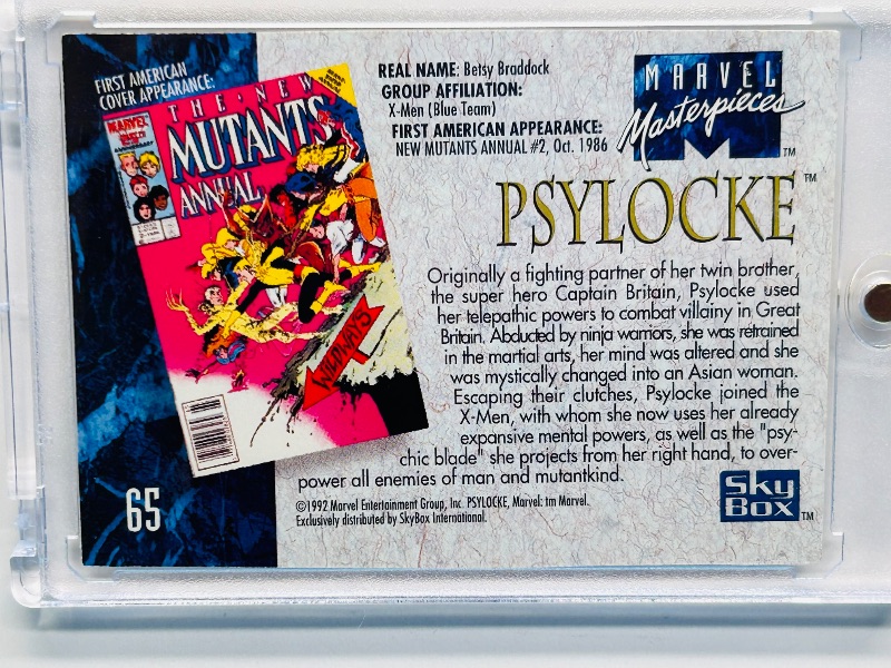 Photo 1 of 025032…Marvel Masterpieces Psylocke card 65 in hard plastic case