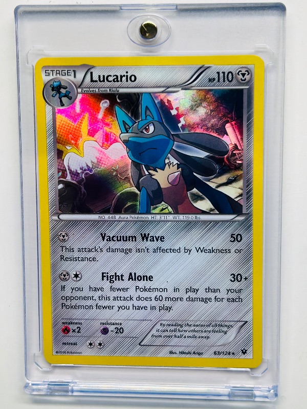 Photo 1 of 025033…Lucario holo Pokémon card in hard plastic case