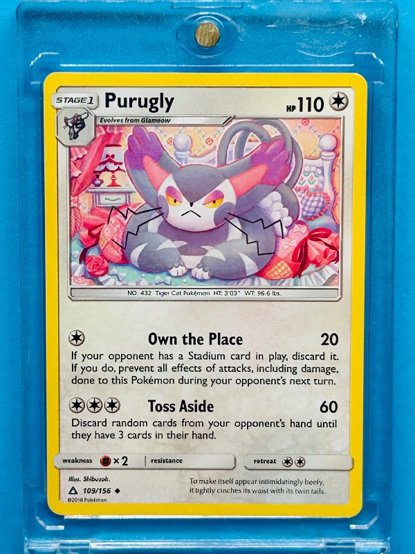 Photo 1 of 025037…Purugly  Pokémon card in hard plastic case