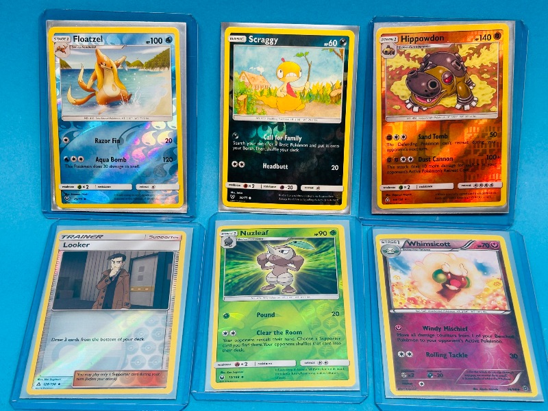 Photo 1 of 025059… 6 Pokémon reverse holo cards in hard plastic sleeves 