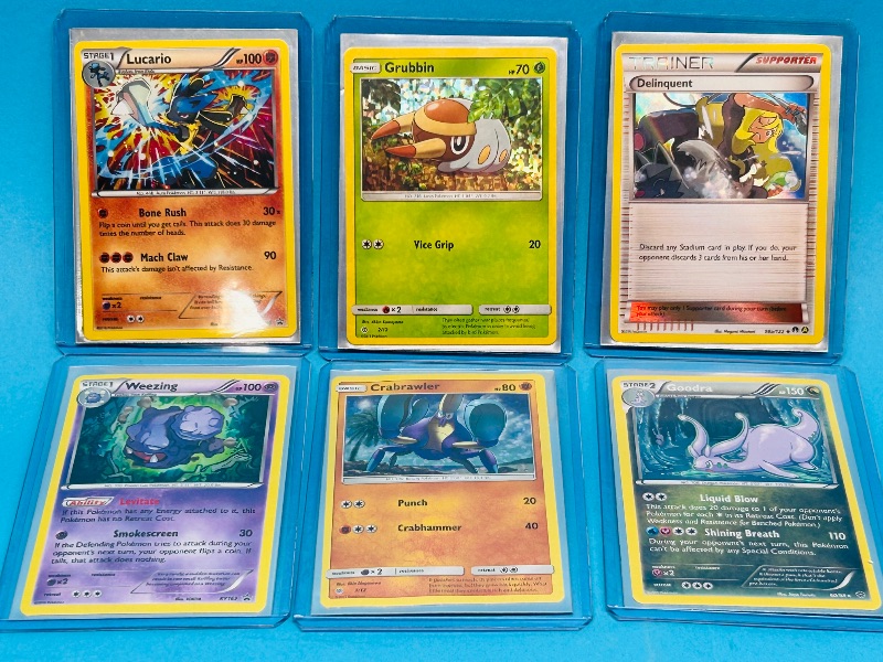 Photo 1 of 025060… 6 Pokémon holo cards in hard plastic sleeves 