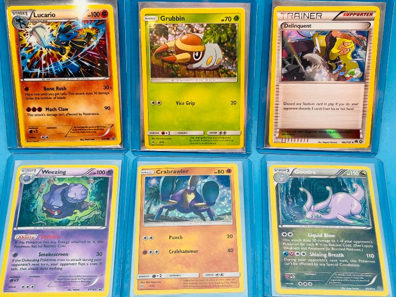 Photo 1 of 025060… 6 Pokémon holo cards in hard plastic sleeves 
