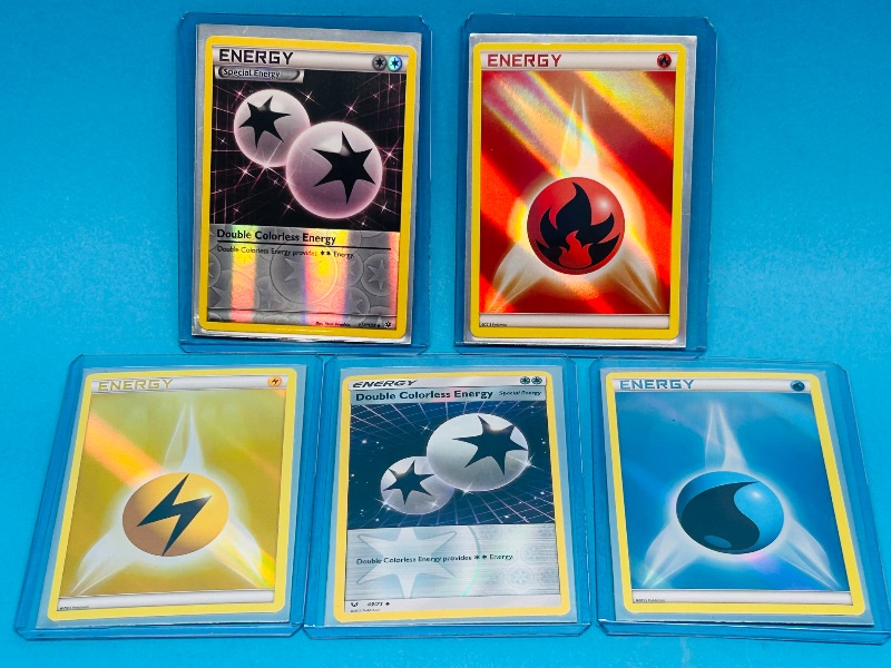 Photo 1 of 025061…5 Pokémon holo energy cards in hard plastic sleeves 
