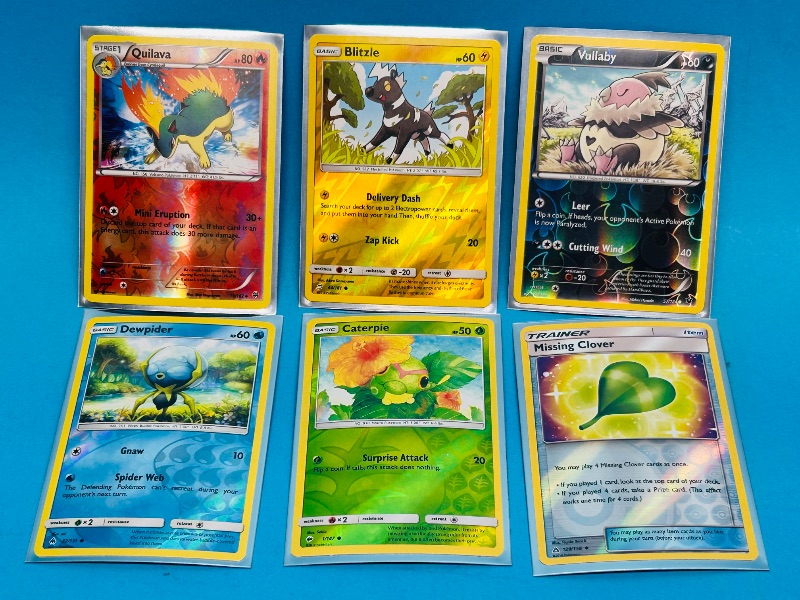 Photo 1 of 025064…6 reverse holo Pokémon cards in hard plastic sleeves 