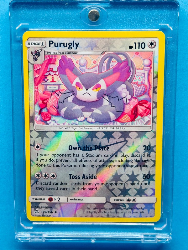 Photo 1 of 025071… Pokémon reverse holo Purugly card in hard plastic case
