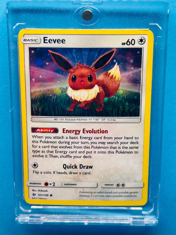 Photo 1 of 025077… Pokémon holo Eevee card in hard plastic case