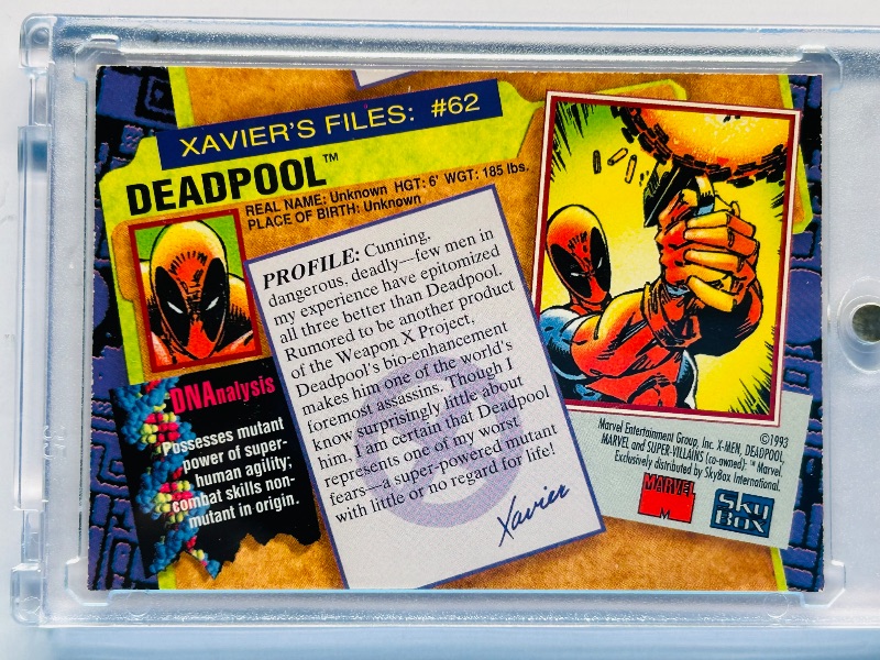Photo 1 of 025106…super-villains Deadpool card 62 in hard plastic case