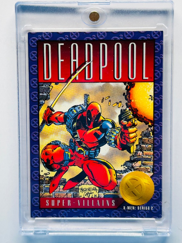 Photo 1 of 025106…super-villains Deadpool card 62 in hard plastic case