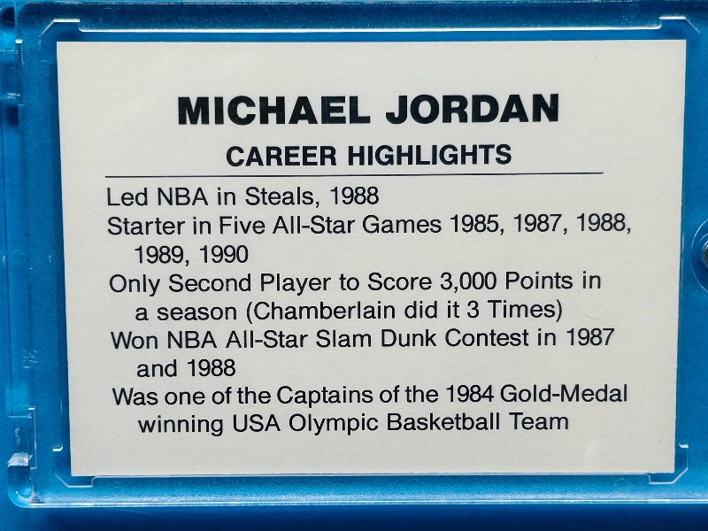 Photo 1 of 025108… Michael Jordan career highlights card  in hard plastic case