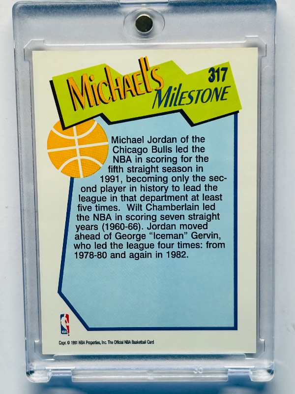 Photo 1 of 025109… Michael Jordan card 317 in hard plastic case