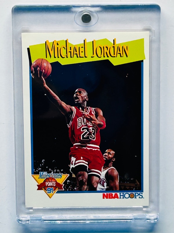 Photo 1 of 025109… Michael Jordan card 317 in hard plastic case