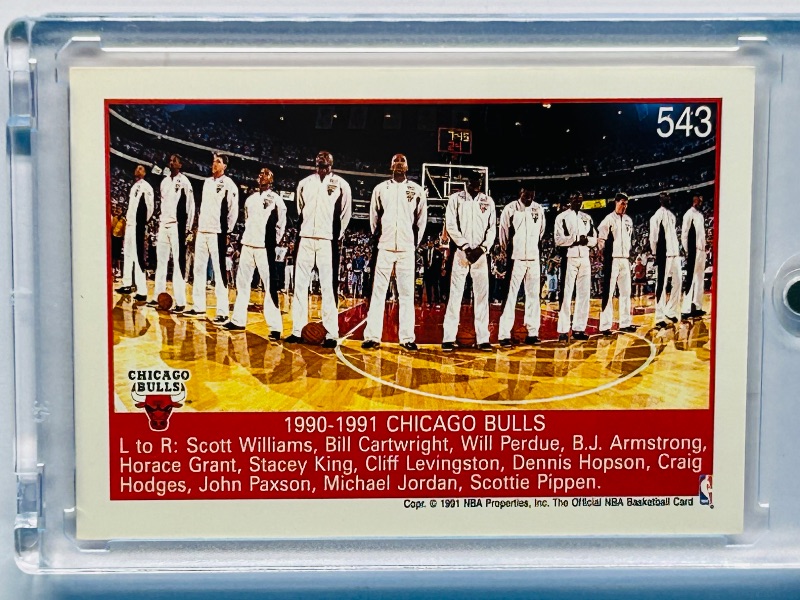 Photo 1 of 025114… Michael Jordan card 543 in hard plastic case