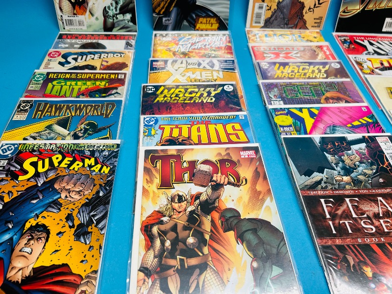 Photo 1 of 025156… final sale no returns/refunds-30 comics in plastic sleeves 