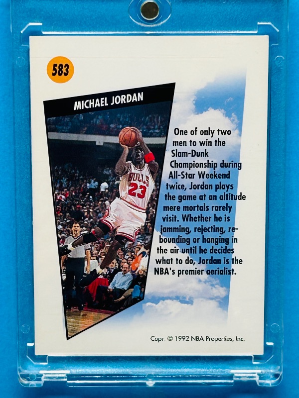 Photo 1 of 025190,,,Skybox Michael Jordan card 583 in hard plastic case