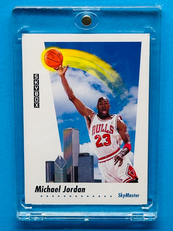 Photo 1 of 025190,,,Skybox Michael Jordan card 583 in hard plastic case