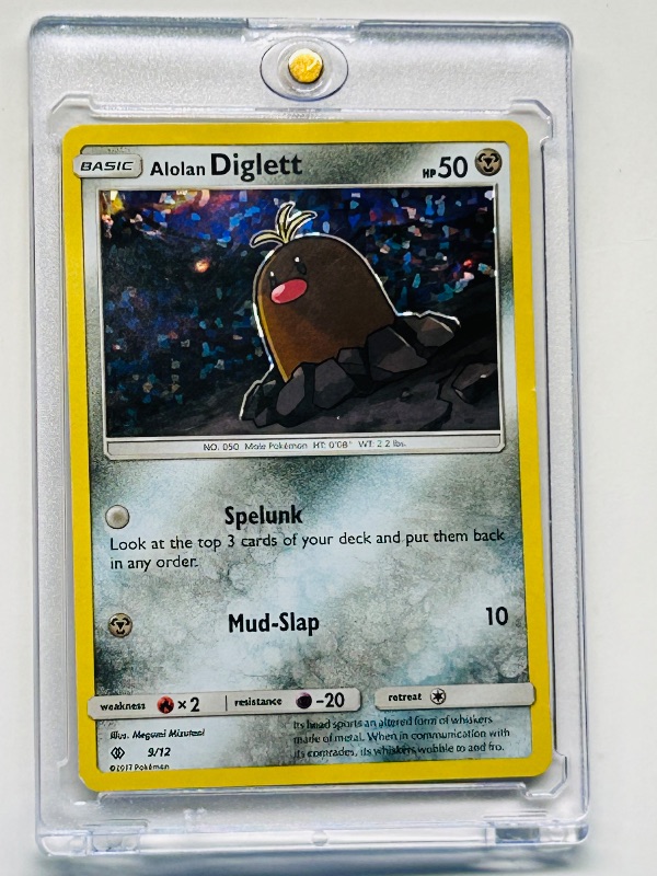 Photo 1 of 025192…holo Alolan Diglett Pokémon card in hard plastic case