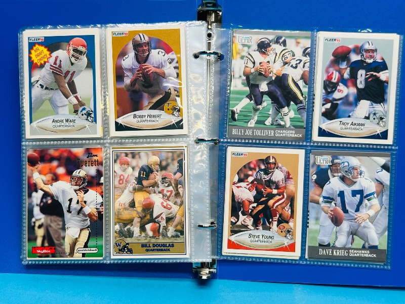 Photo 1 of 025228… final sale no returns/refunds-112 mixed football quartback cards in binder