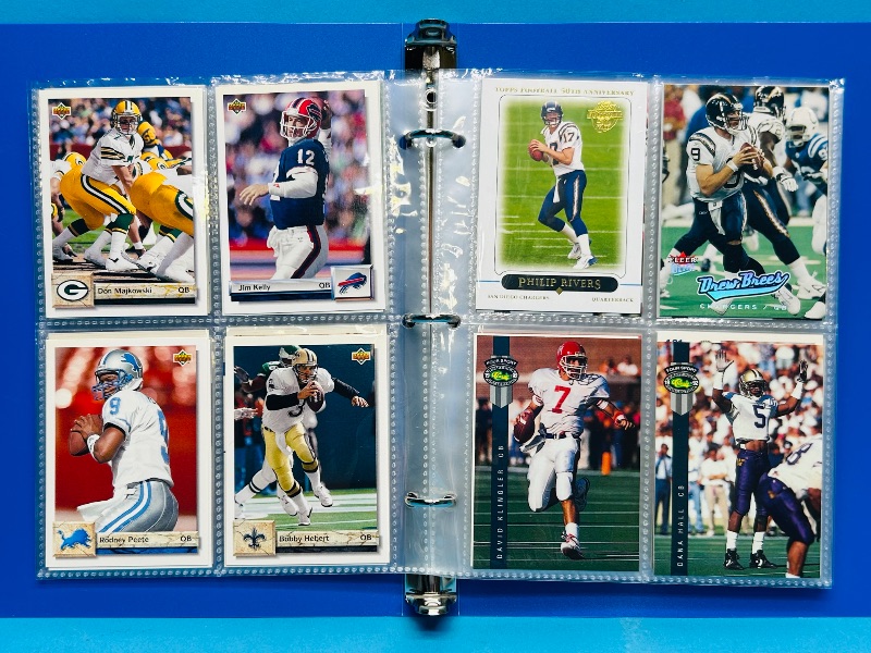 Photo 1 of 025228… final sale no returns/refunds-112 mixed football quartback cards in binder