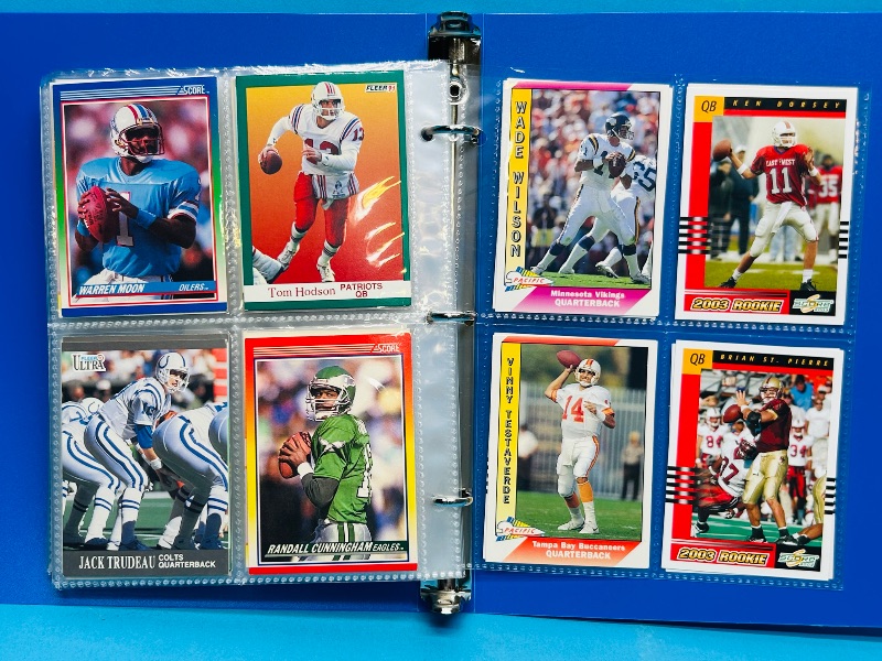 Photo 1 of 025228… final sale no returns/refunds-112 mixed football quartback cards in binder
