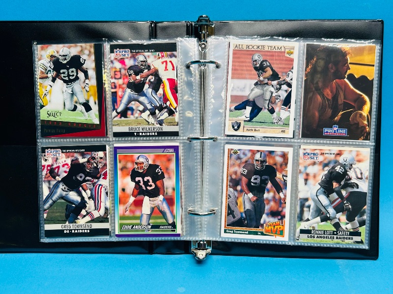 Photo 1 of 025229… final sale no returns/refunds-124 mixed Raiders football cards in binder