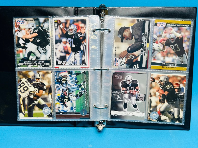 Photo 1 of 025229… final sale no returns/refunds-124 mixed Raiders football cards in binder