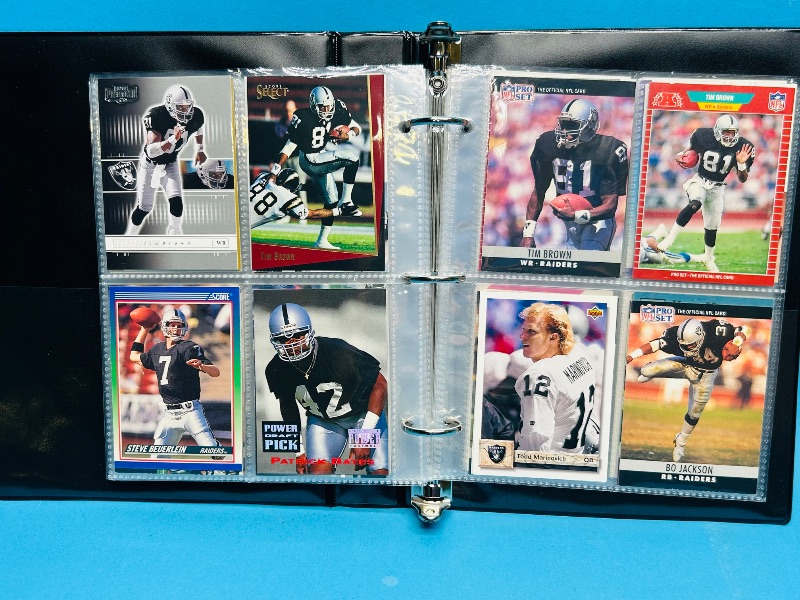 Photo 1 of 025229… final sale no returns/refunds-124 mixed Raiders football cards in binder
