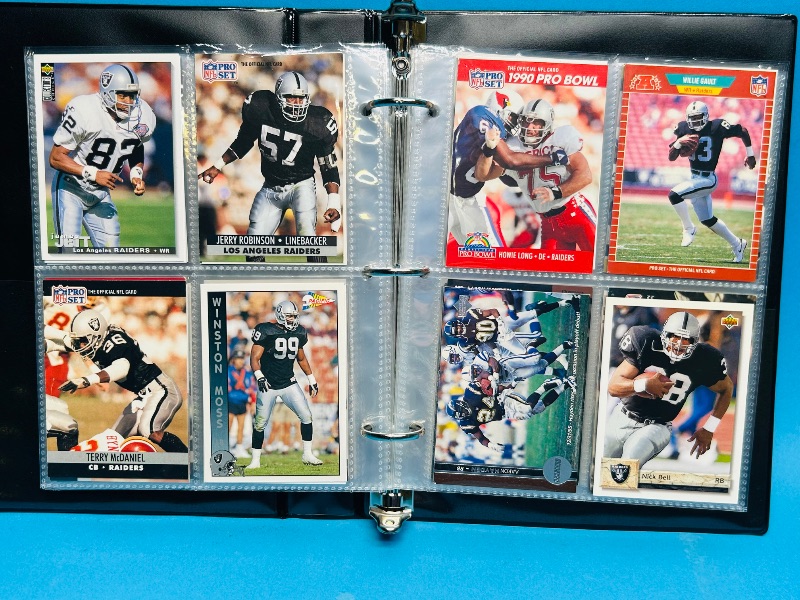 Photo 1 of 025229… final sale no returns/refunds-124 mixed Raiders football cards in binder
