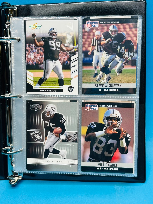 Photo 1 of 025229… final sale no returns/refunds-124 mixed Raiders football cards in binder
