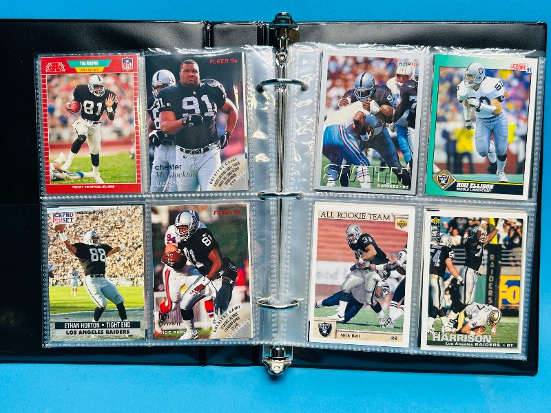 Photo 1 of 025229… final sale no returns/refunds-124 mixed Raiders football cards in binder