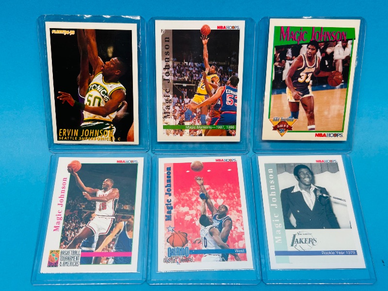 Photo 1 of 025235…6 Magic Johnson  cards in hard plastic sleeves 