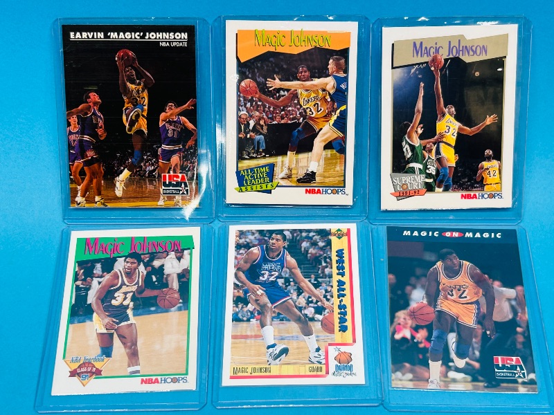 Photo 1 of 025239…6 Magic Johnson  cards in hard plastic sleeves 