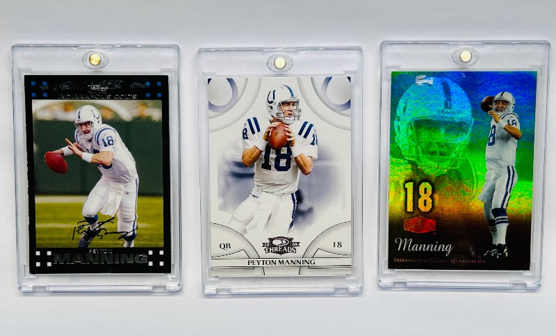 Photo 1 of 025243…3 Peyton Manning  cards in hard plastic cases 