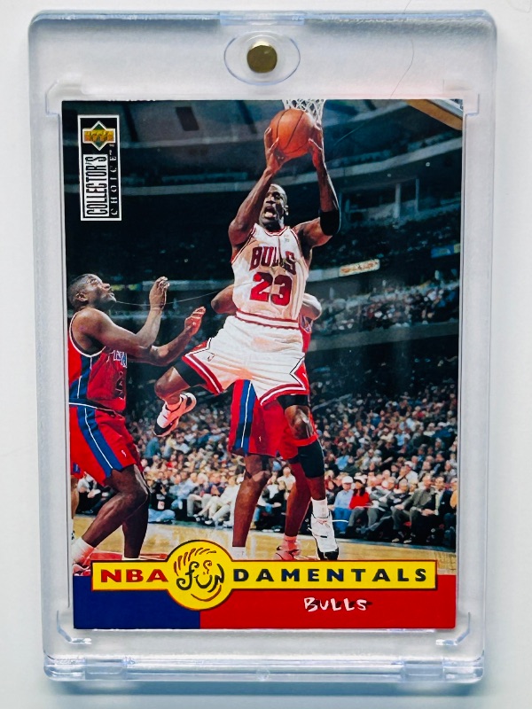 Photo 1 of 025258…Michael Jordan card 195 fundamentals in hard plastic case