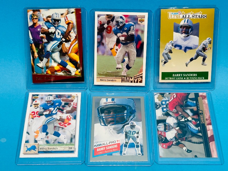 Photo 1 of 025264…6 Barry Sanders cards in hard plastic sleeves 