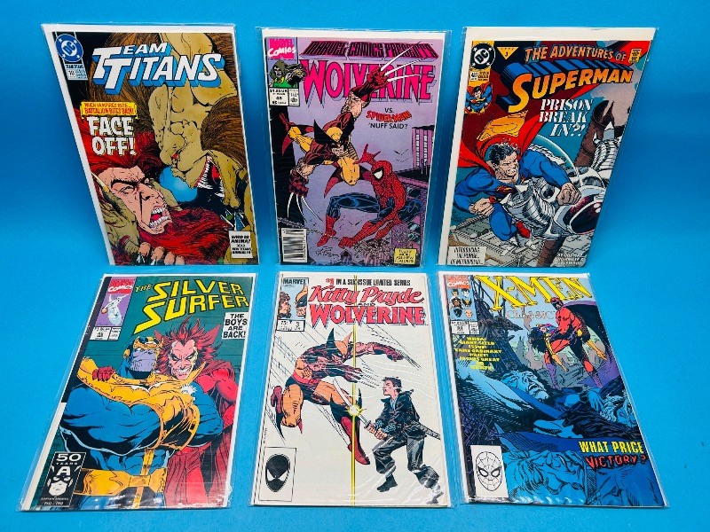 Photo 1 of 025283…damaged- folds, stains, wear -comics in plastic sleeves 